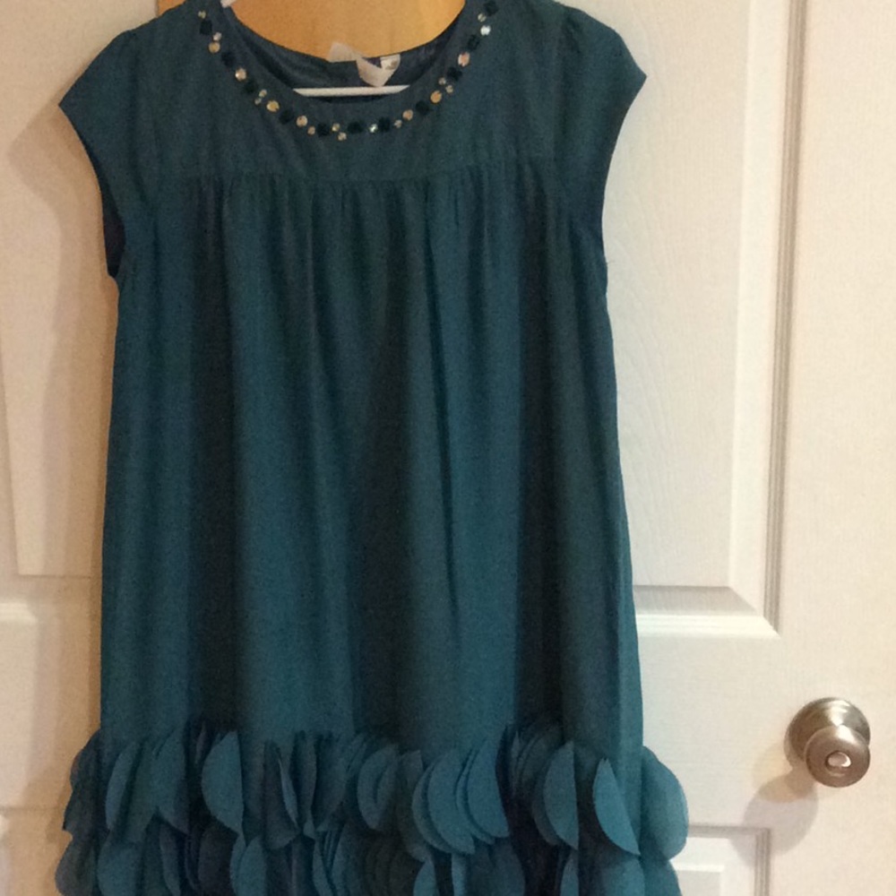Blue-green dress with faux stones at the neck